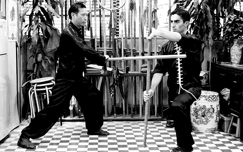 Leon Dogan and LAm Chun Sing sifu demonstrating the stick sparring form